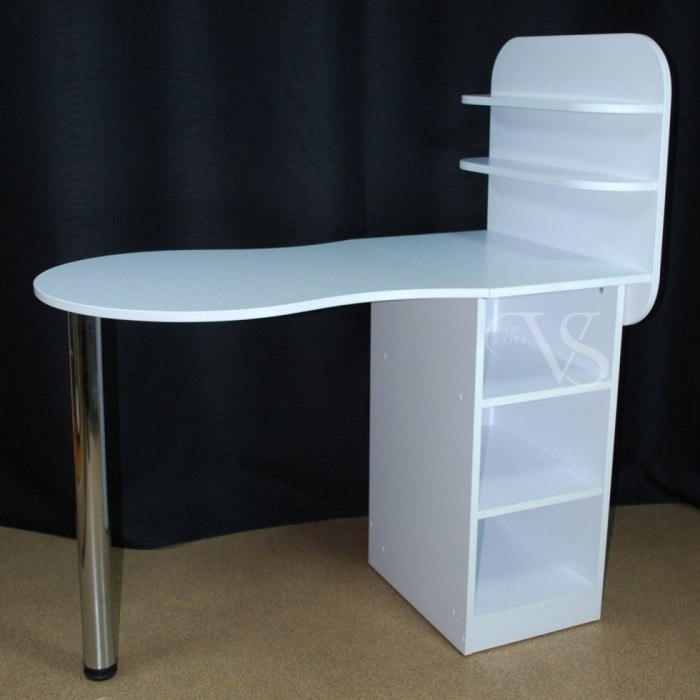 Inexpensive manicure table in a beauty salon