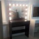 Make-up table, illuminated make-up mirror